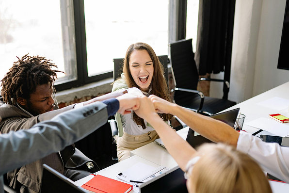 Satisfied team in a meeting.